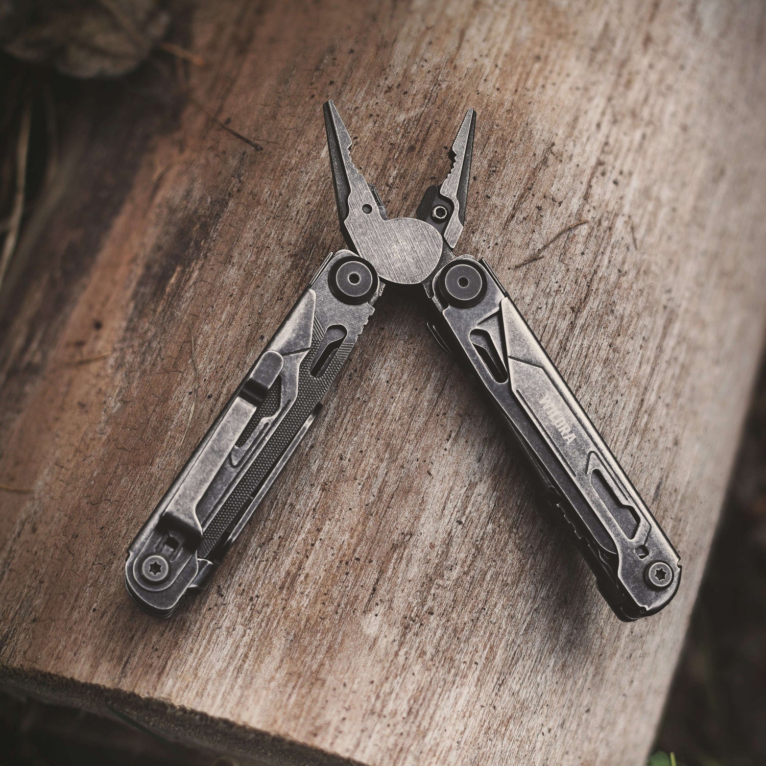 Multitool on a wooden surface