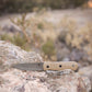Wilora Heaford field knife used outdoors on camp gear