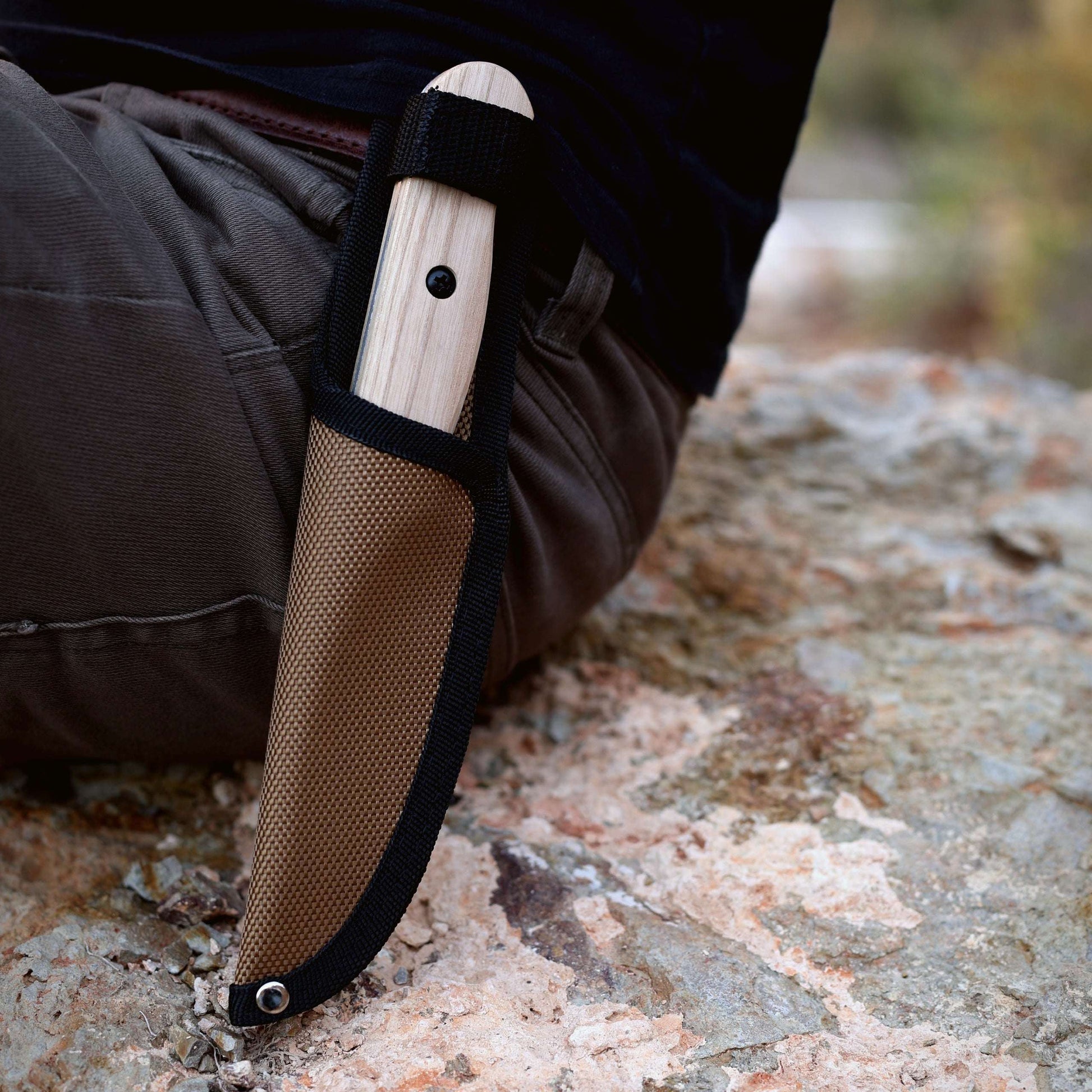 Wilora Heaford field knife carried with a leather sheath