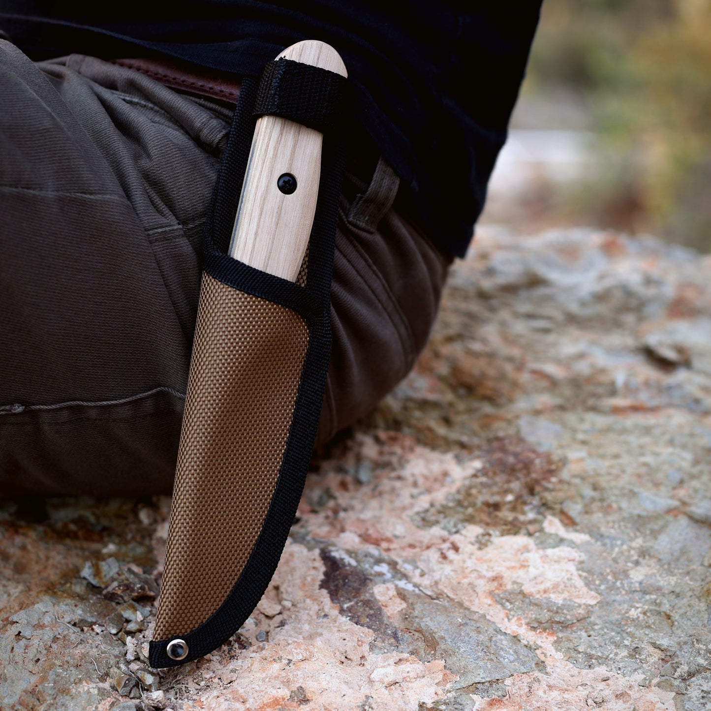 Wilora Heaford field knife carried with a leather sheath