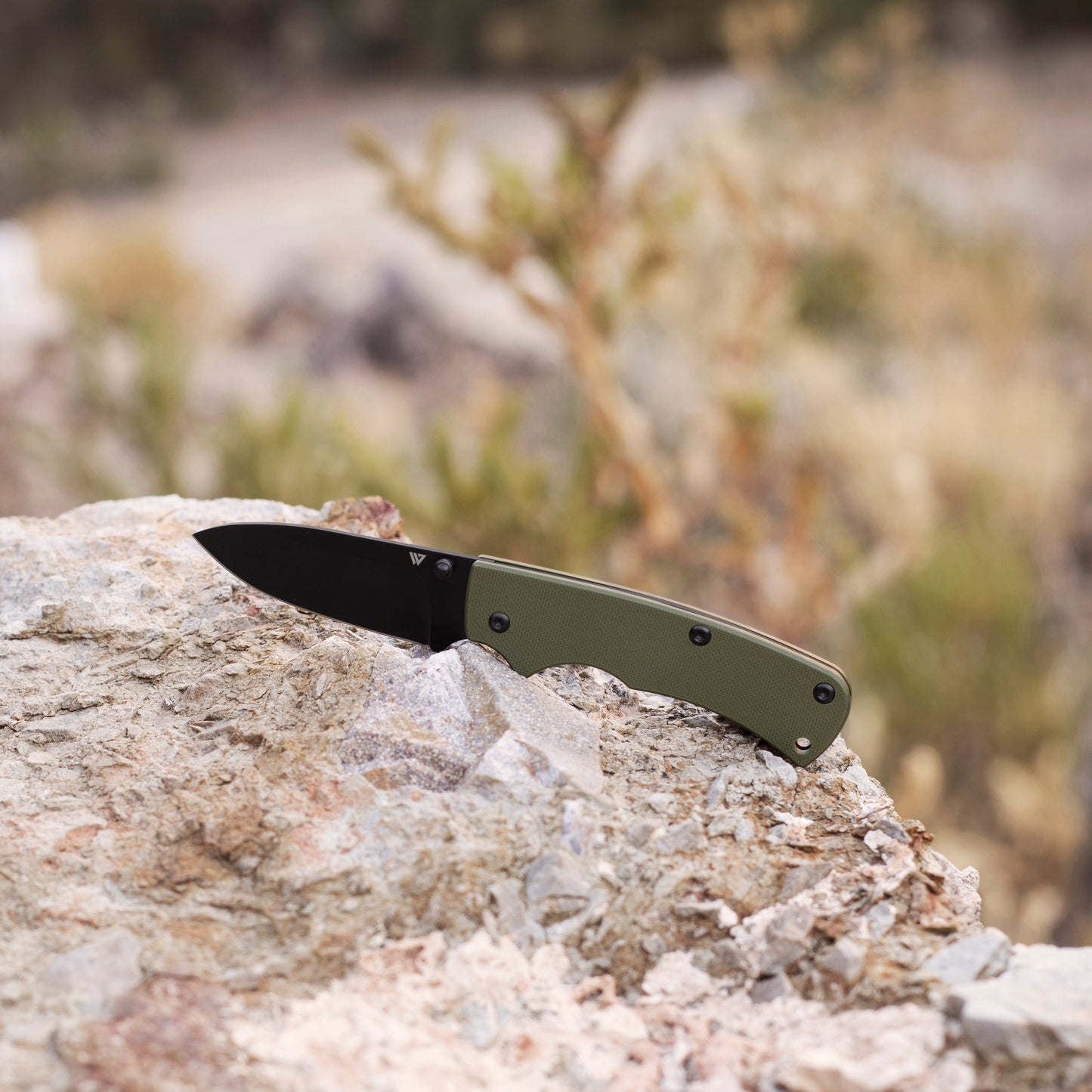 Wilora Slip Joint folding knife with green handle and black blade