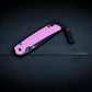 Wilora The Tarn D2 folding knife closed with pink G10 handle