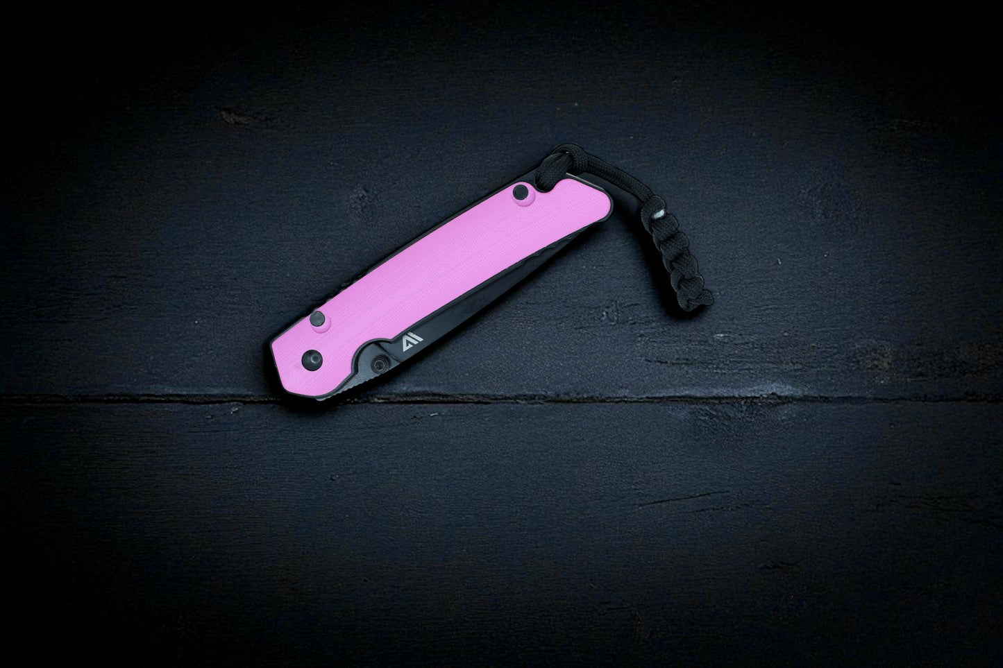 Wilora The Tarn D2 folding knife closed with pink G10 handle