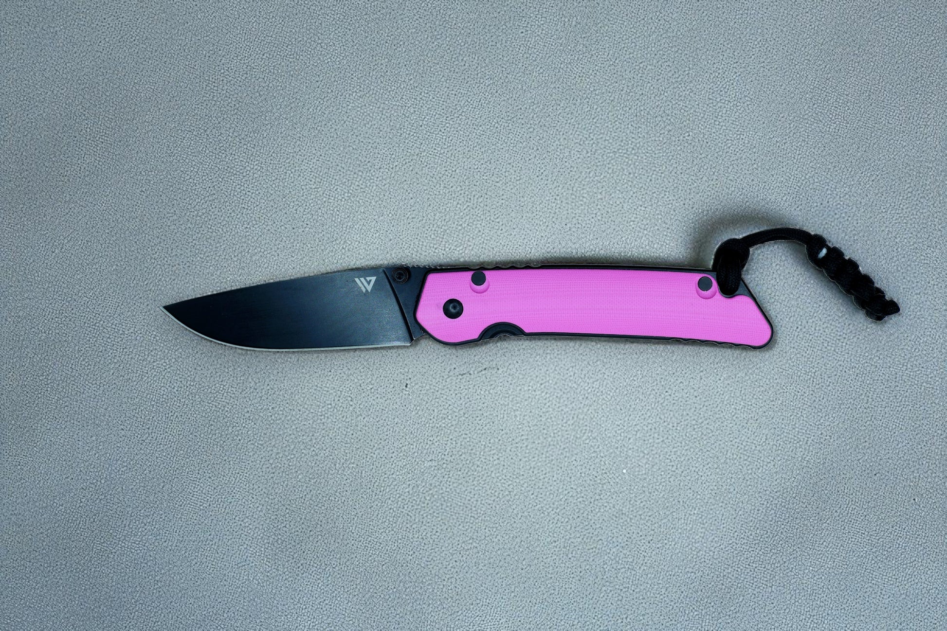 Wilora The Tarn Folding knife with a pink handle and a black blade