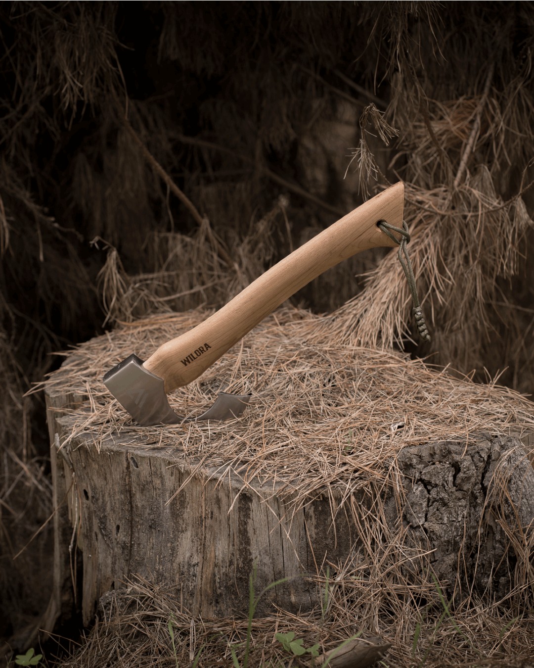 Wilora Wooden-handled axe on a log